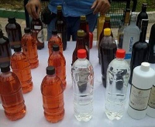 عکس/کشف ۷۰۰ بطری مشروبات الکلی در تهران