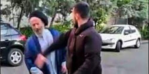  عکس/ پدر و پسر سازنده کلیپ سیلی خوردن یک روحانی بعد از دستگیری