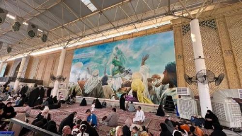 نقاشی یک ایرانی بر دیوار حرم امیرالمومنین(ع)