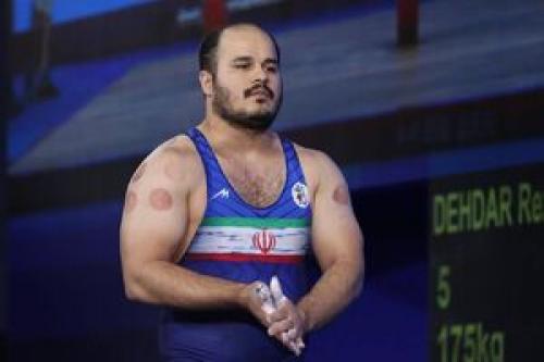وزنه‌بردار ایران:مطمئن باشید برای المپیک جانم را می‌گذارم