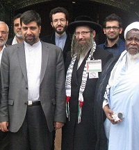  عکس/ رهبر شیعیان نیجریه در کنار شهید منا