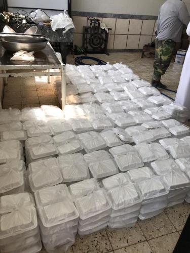 پخش غذا توسط هیات جاماندگان به روستای سیل زده جرگه سیدعلی 