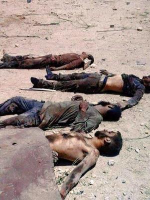 عکس/ سلفی یادگاری با مردگان داعش +18