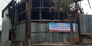  ترفند یک کارمند بانک درمقابل اغتشاشگران +عکس