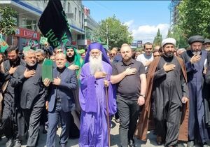  حضور سفیر ایران با قرآن در تاسوعای شیعیان گرجستان 