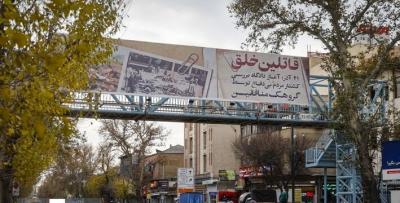  عکس/ نمایش جنایات گروهک منافقین در شهر تهران