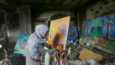 نقاشی زن فلسطین در میان ویرانی 