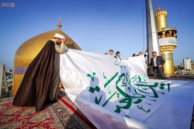 اهتزاز پرچم «ای فرزند کعبه» در حرم امام علی(ع) 