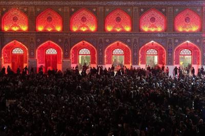 تعویض پرچم حرم کاظمین 