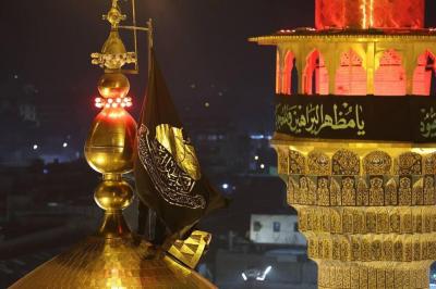 تعویض پرچم حرم کاظمین 