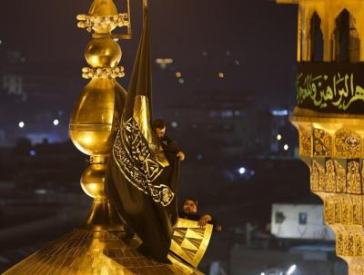 تعویض پرچم حرم کاظمین 