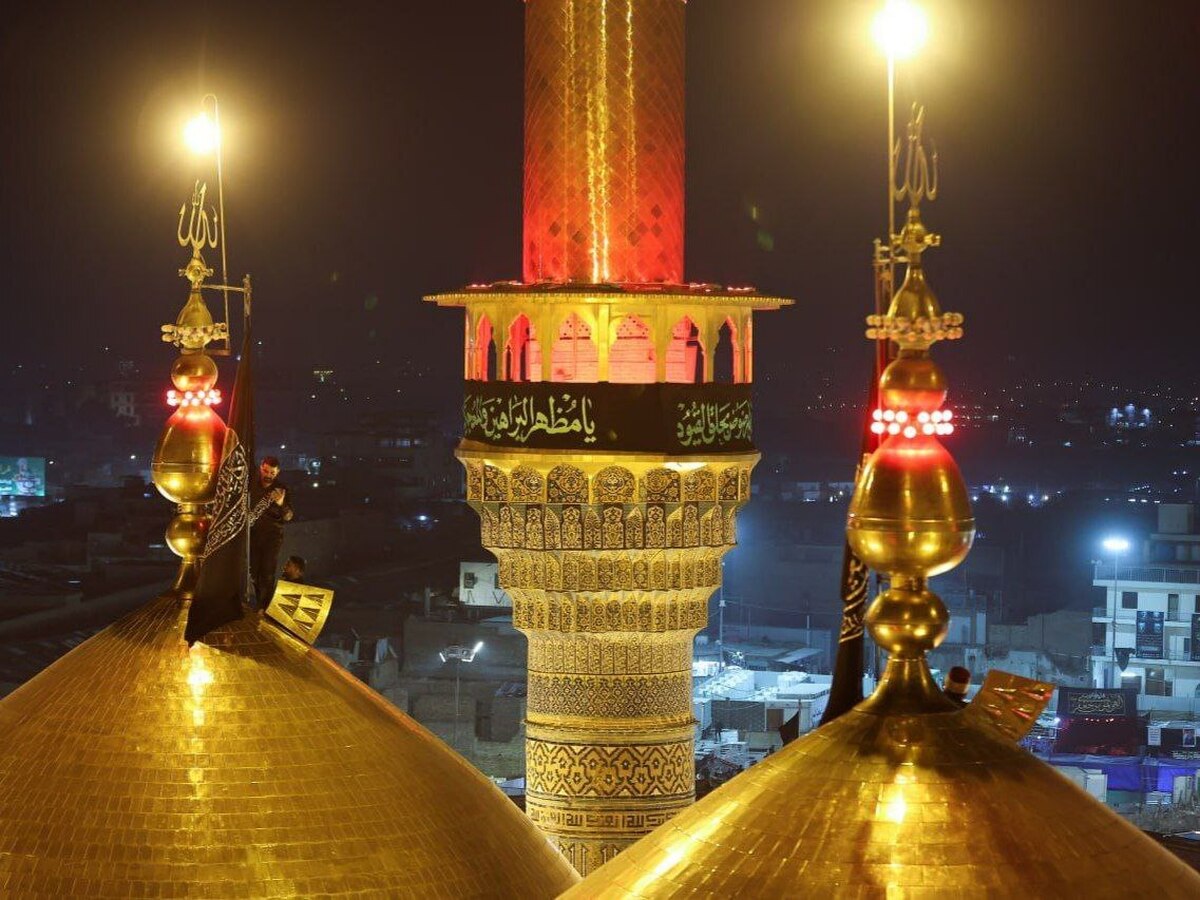 تعویض پرچم حرم کاظمین 