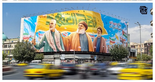  پرچم داران مقاومت بر دیوارنگاره میدان انقلاب تهران