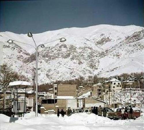 عکس رنگی از تجریش در یک روز برفی در سال 1336   