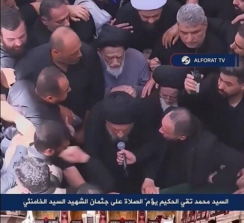 اقامه نماز آیت الله حکیم بر پیکر رهبر شهید انقلاب در نجف اشرف+ فیلم