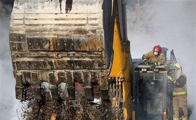 عکس/پیکر آتش نشانان در روز هفتم حادثه پلاسکو 
