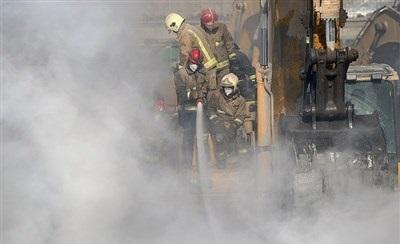 عکس/پیکر آتش نشانان در روز هفتم حادثه پلاسکو 