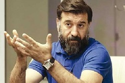 عکس یادگاری علی انصاریان با جانی دپ