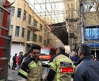  عکس/ آتش‌سوزی در خیابان انقلاب تهران